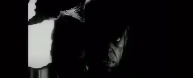 Manster from the trailer (black and white still, low light, showing the monster)