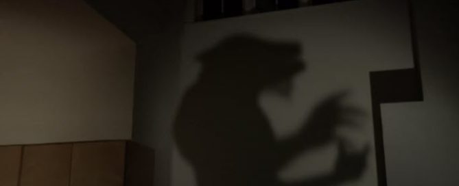 Silhouette of a werewolf against a wall